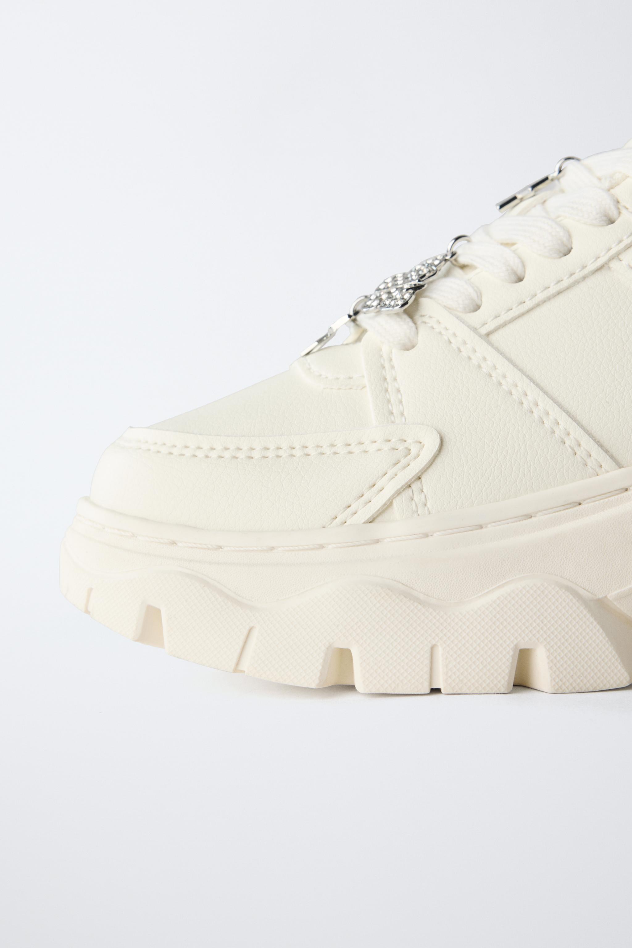 THICK-SOLED SNEAKERS WITH CHARMS